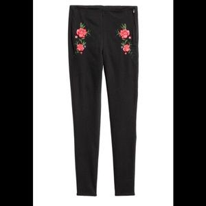 H&M black embroidered stretch pants.